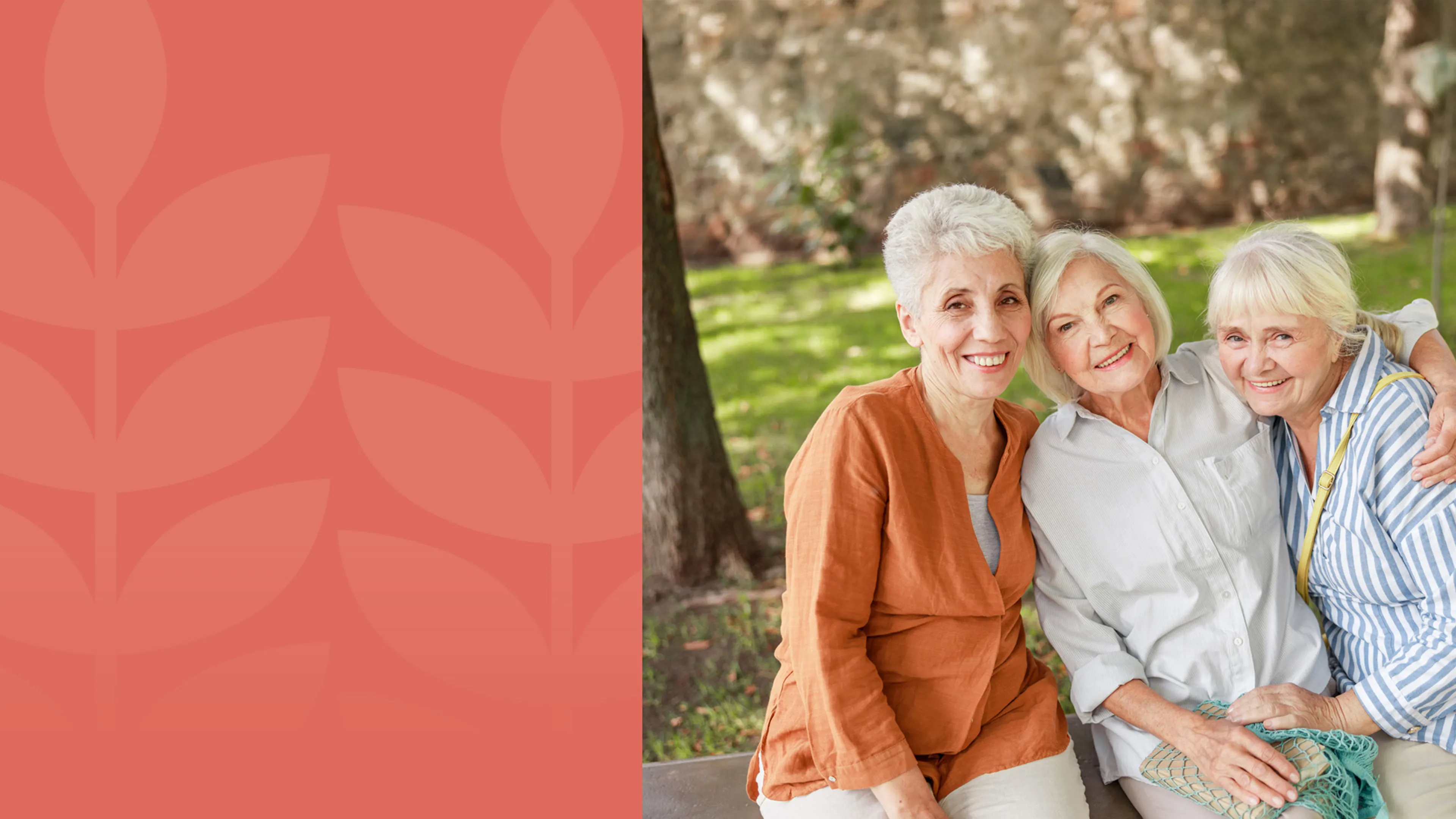 A group of senior ladies stand outside. Their arms are wrapped around each other and they're smiling at the camera.