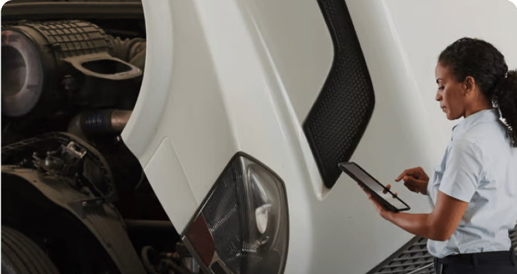 Maintenance being performed on a fleet vehicle