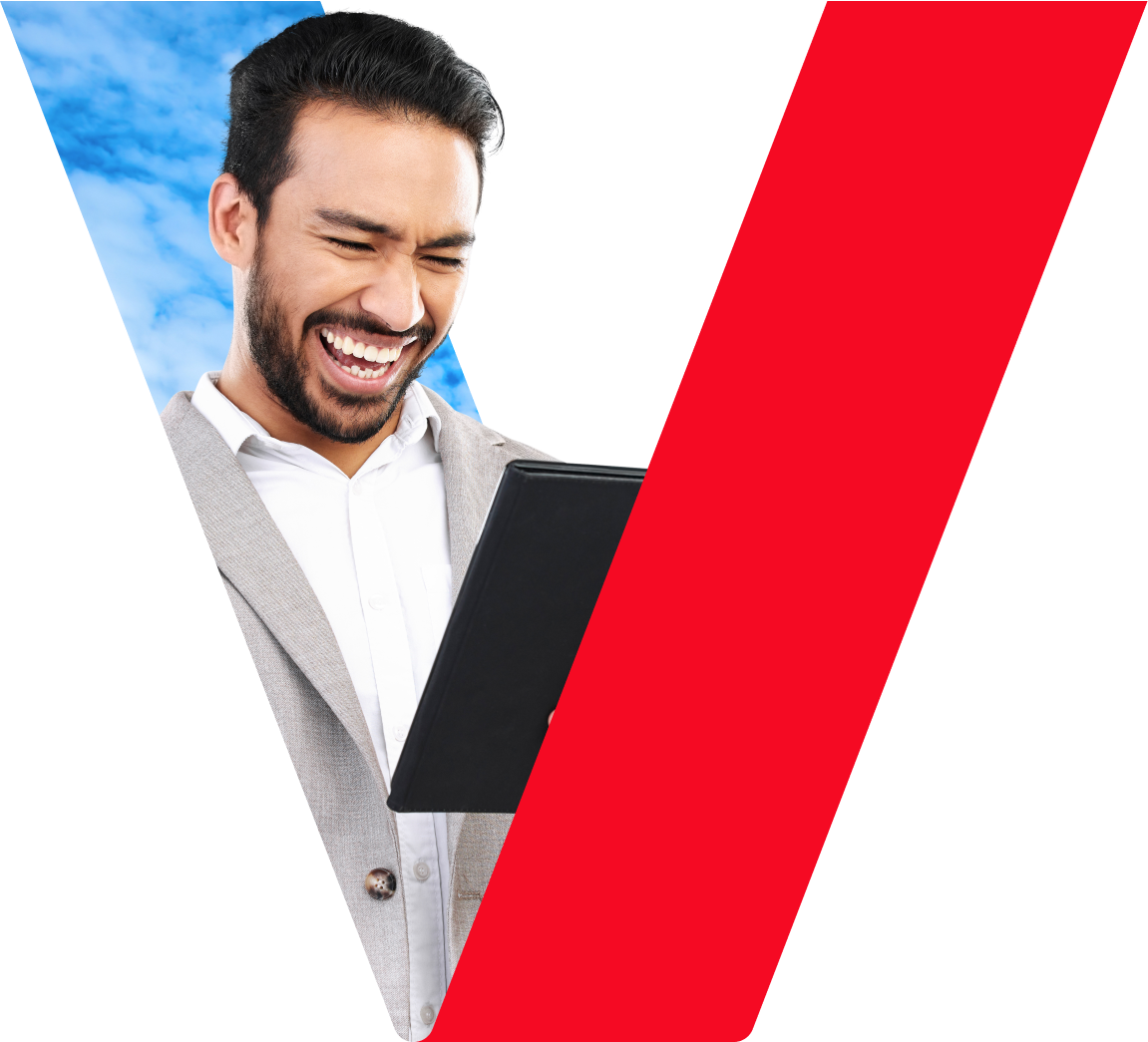 A man looking at a tablet