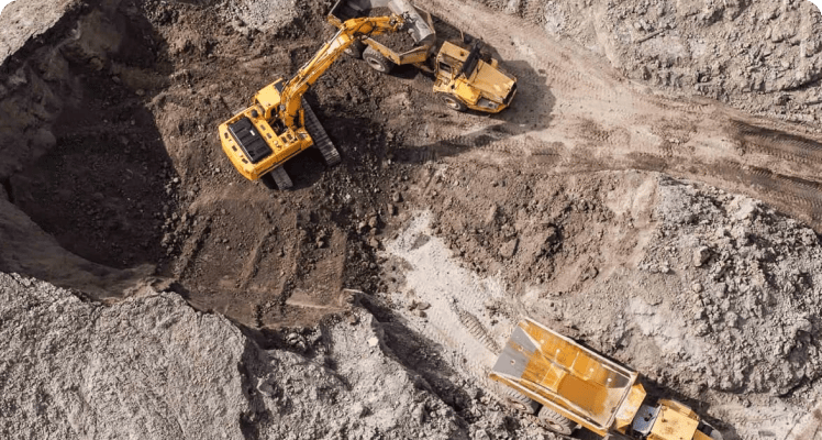 Construction fleet vehicles at a job site