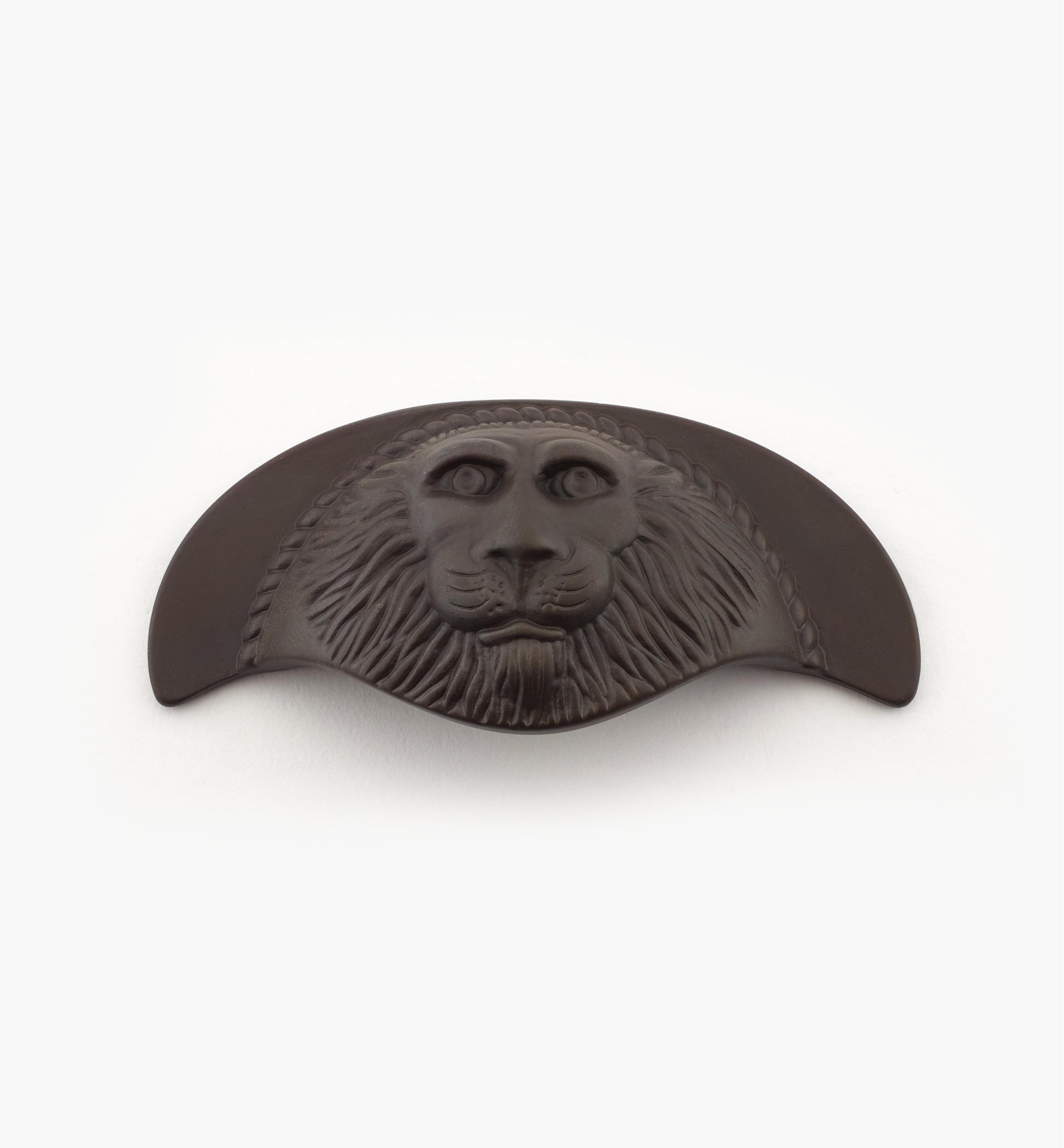 Poignée à tête de lion
