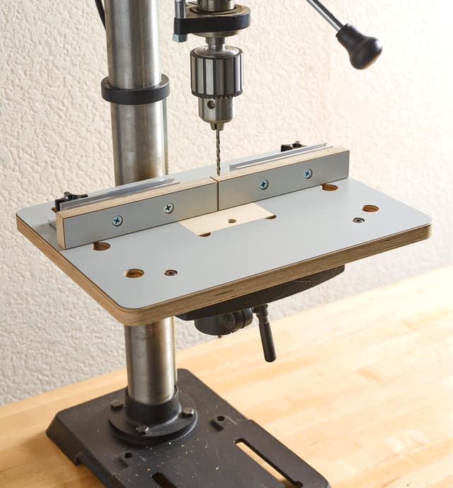 A Veritas small drill-press table and fence mounted on a drill press