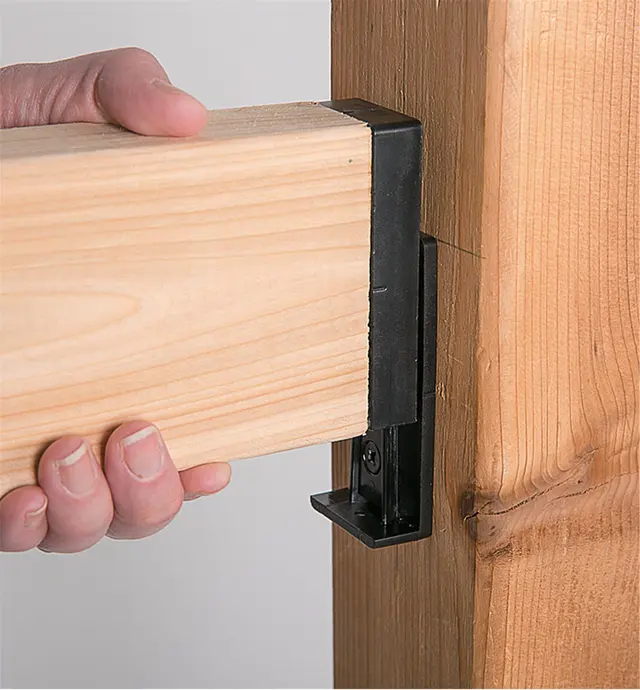 Connecting a railing to a post with a railing connector
