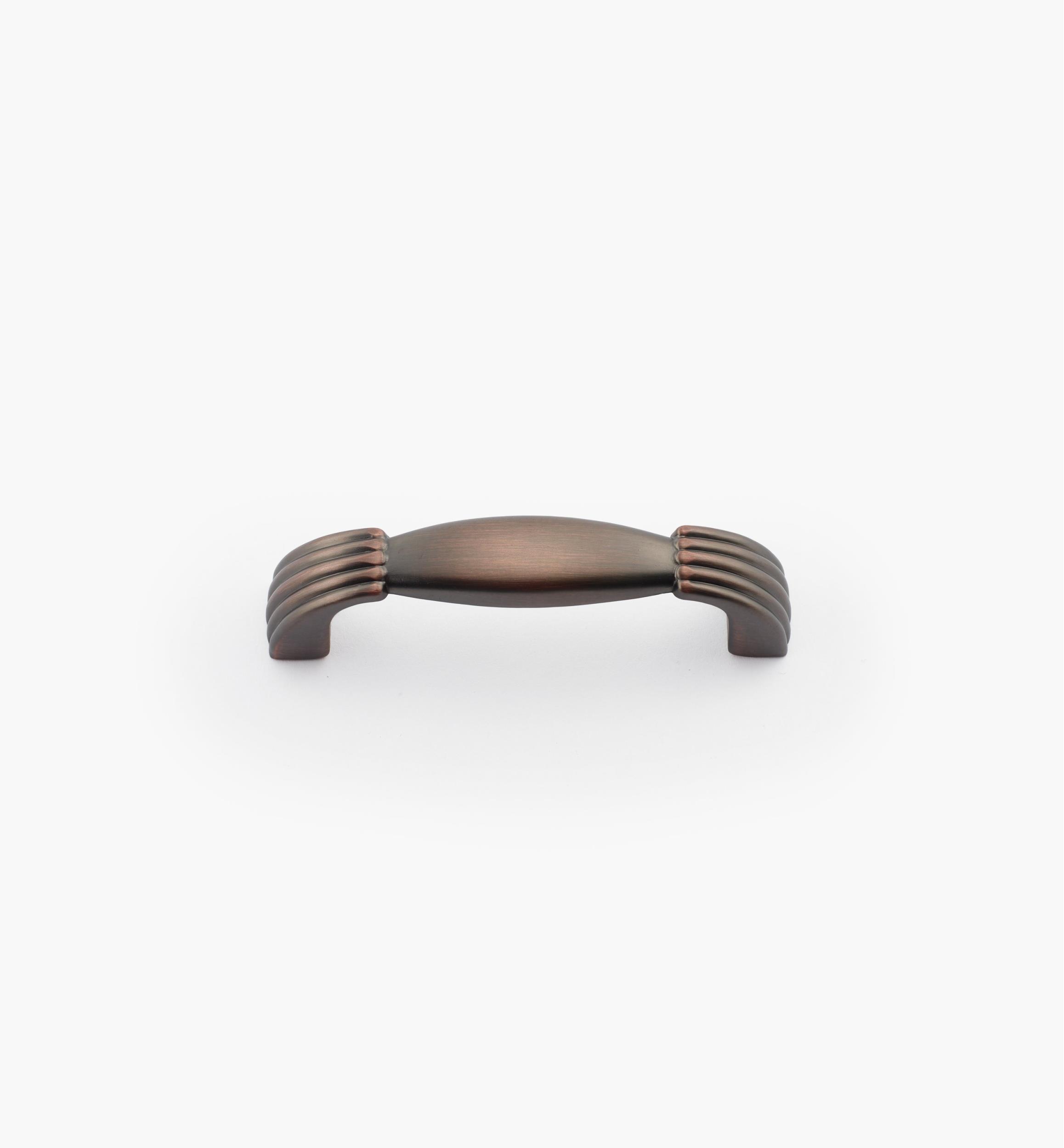 Poignées à pieds cannelés