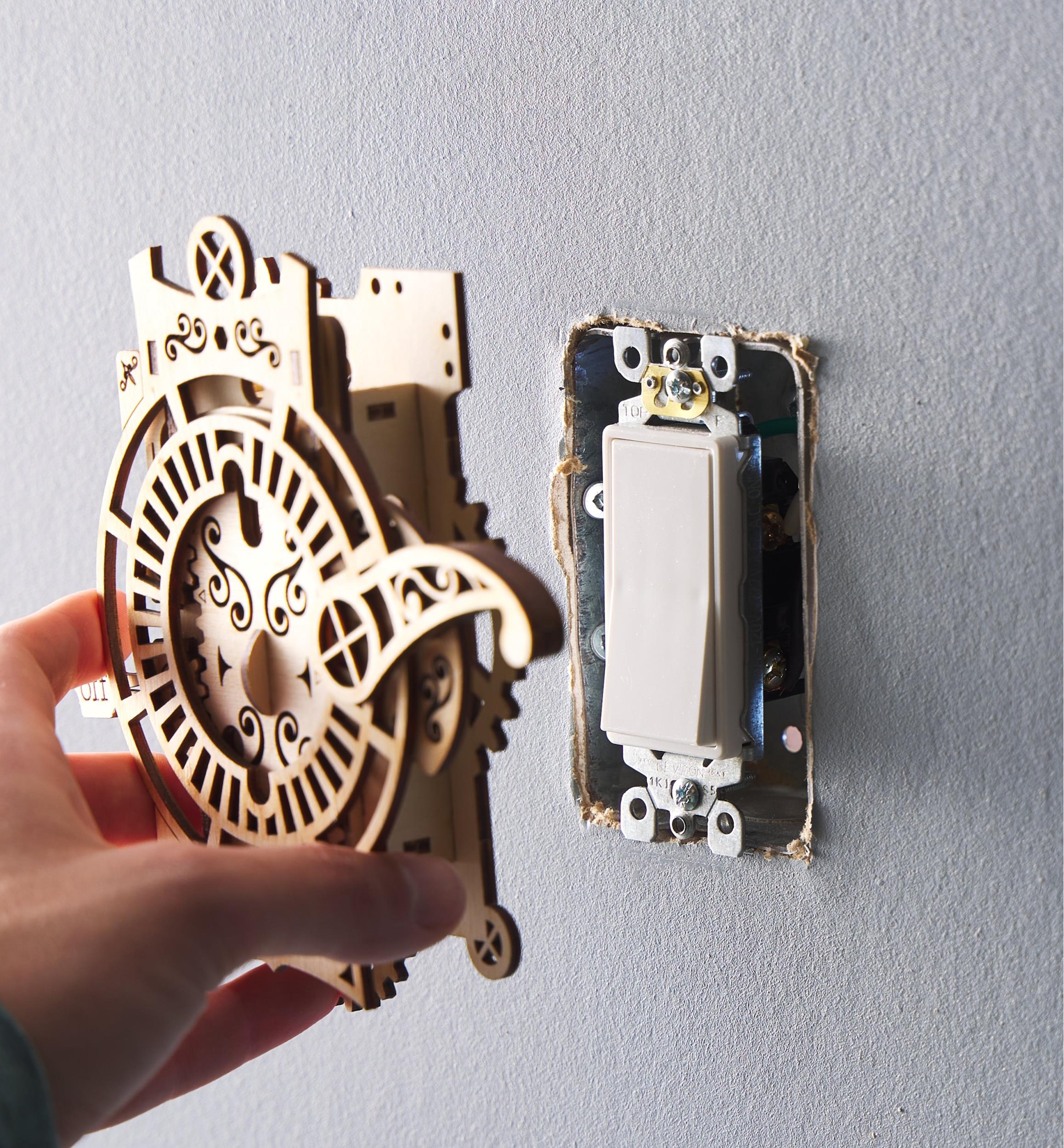 Plaque d’interrupteur à assembler – Engrenages