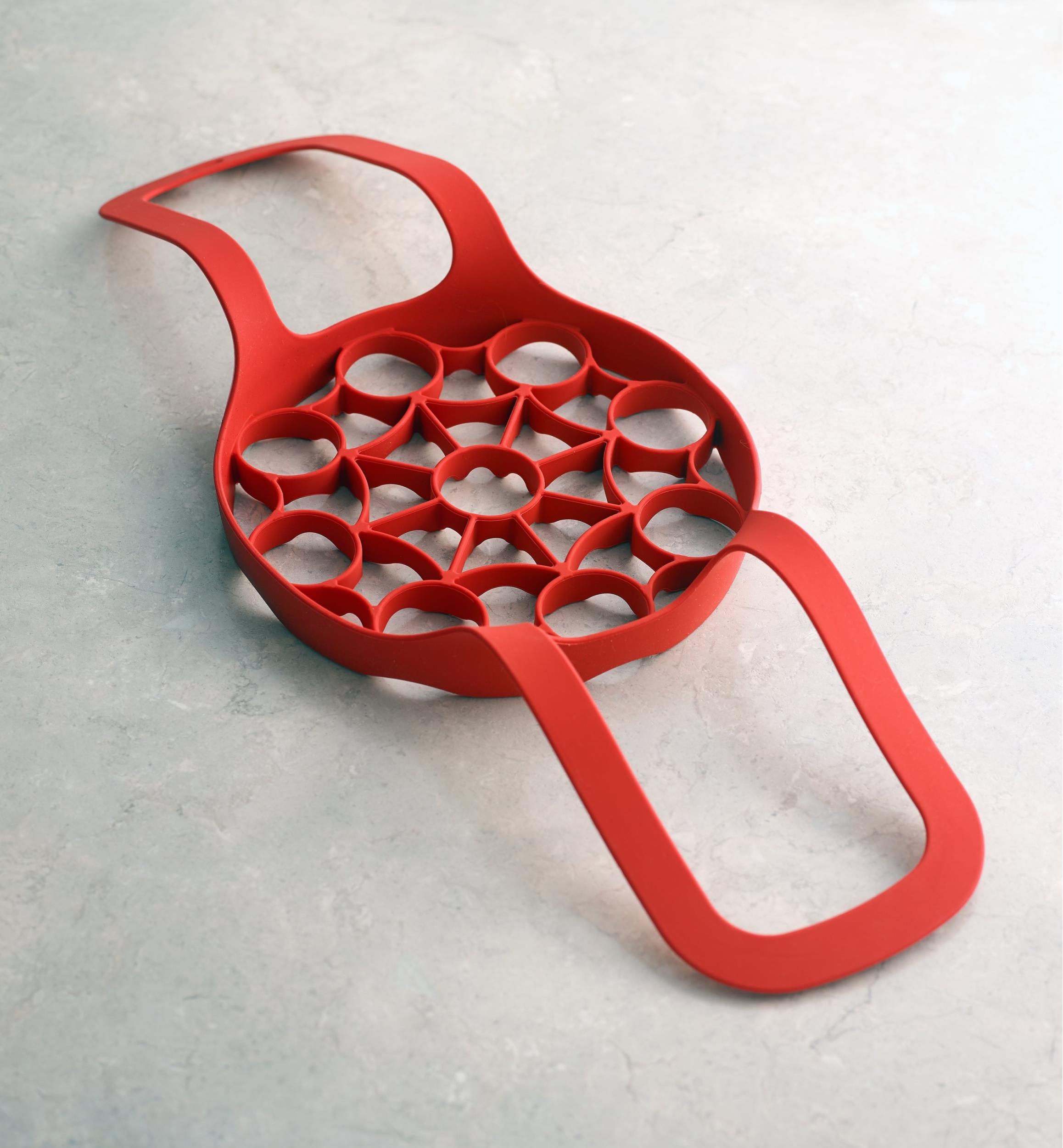 Grille à poignées en silicone pour autocuiseur