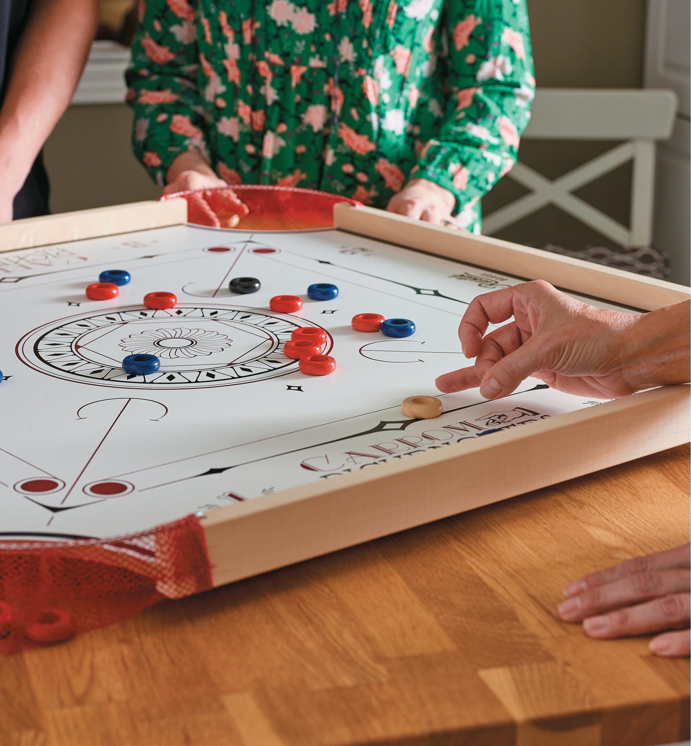 Jeu de pichenottes et carrom