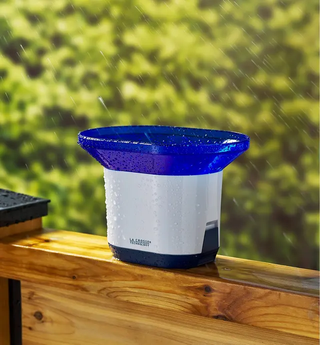 Rain bucket for the wireless rain station on a deck railing