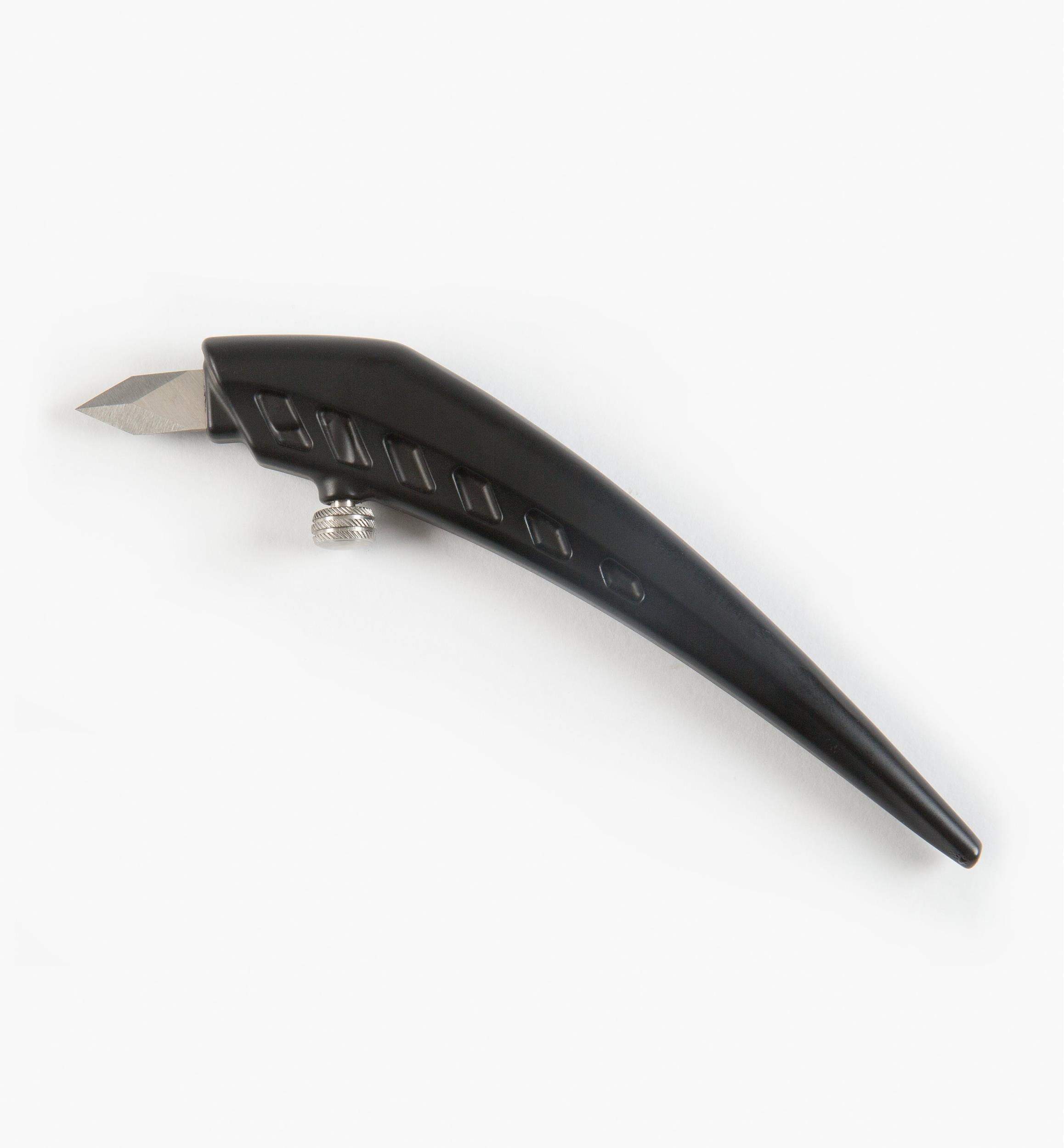 Black Veritas Shop Knife with exposed spear-point blade on a white background