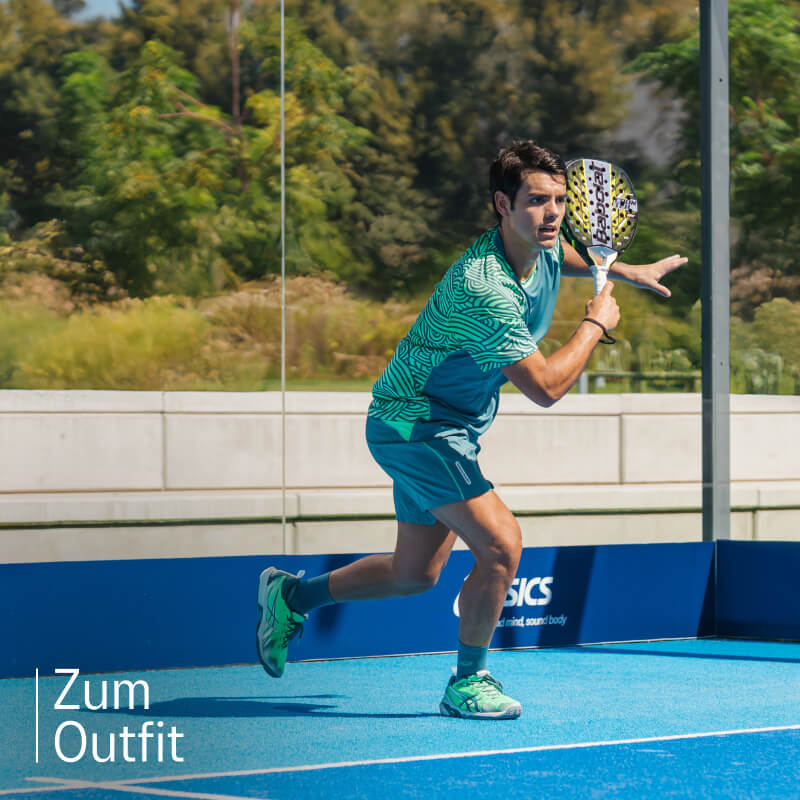 Athlete playing padel wearing padel shoes from ASICS on a blue court.
