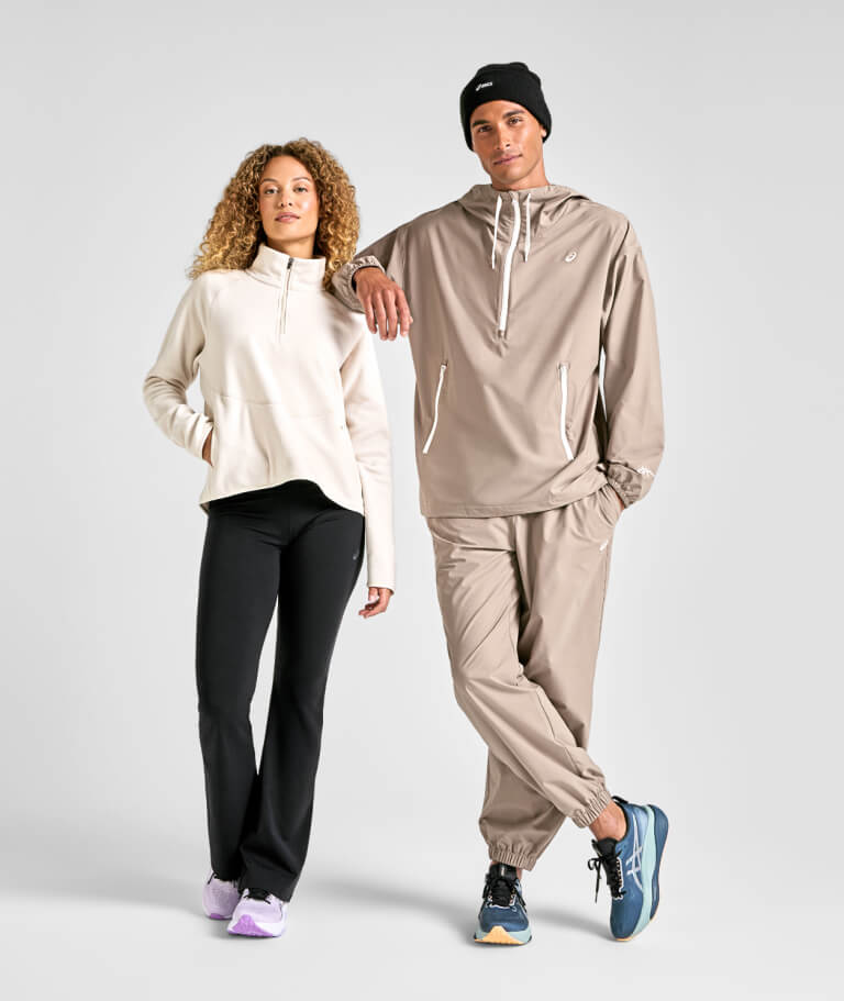 Man and woman wearimg ASICS Performance Life collection