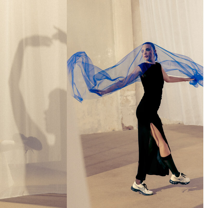 Woman in dress and ASICS GEL CUMULUS 16