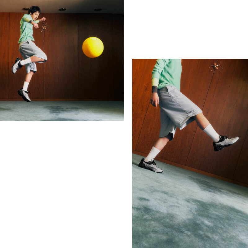 Man wearing ASICS GEL-KINETIC FR kicking a ball