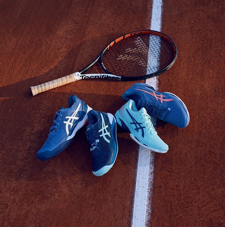 tennis shoes on court