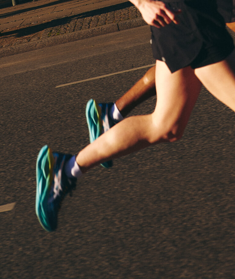 Runners wearing ASICS Superblast 3 Copenhagen Edition
