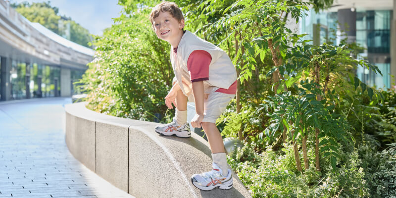 Boy wearing ASICS SPS Shoes