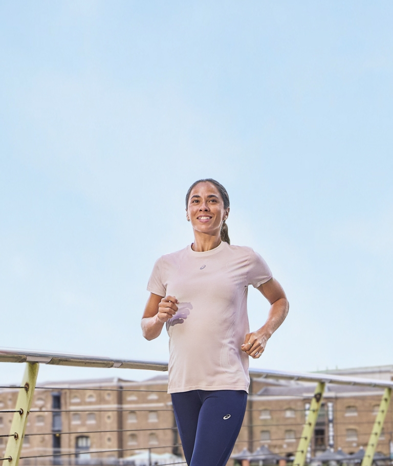 Woman running with pink shirt