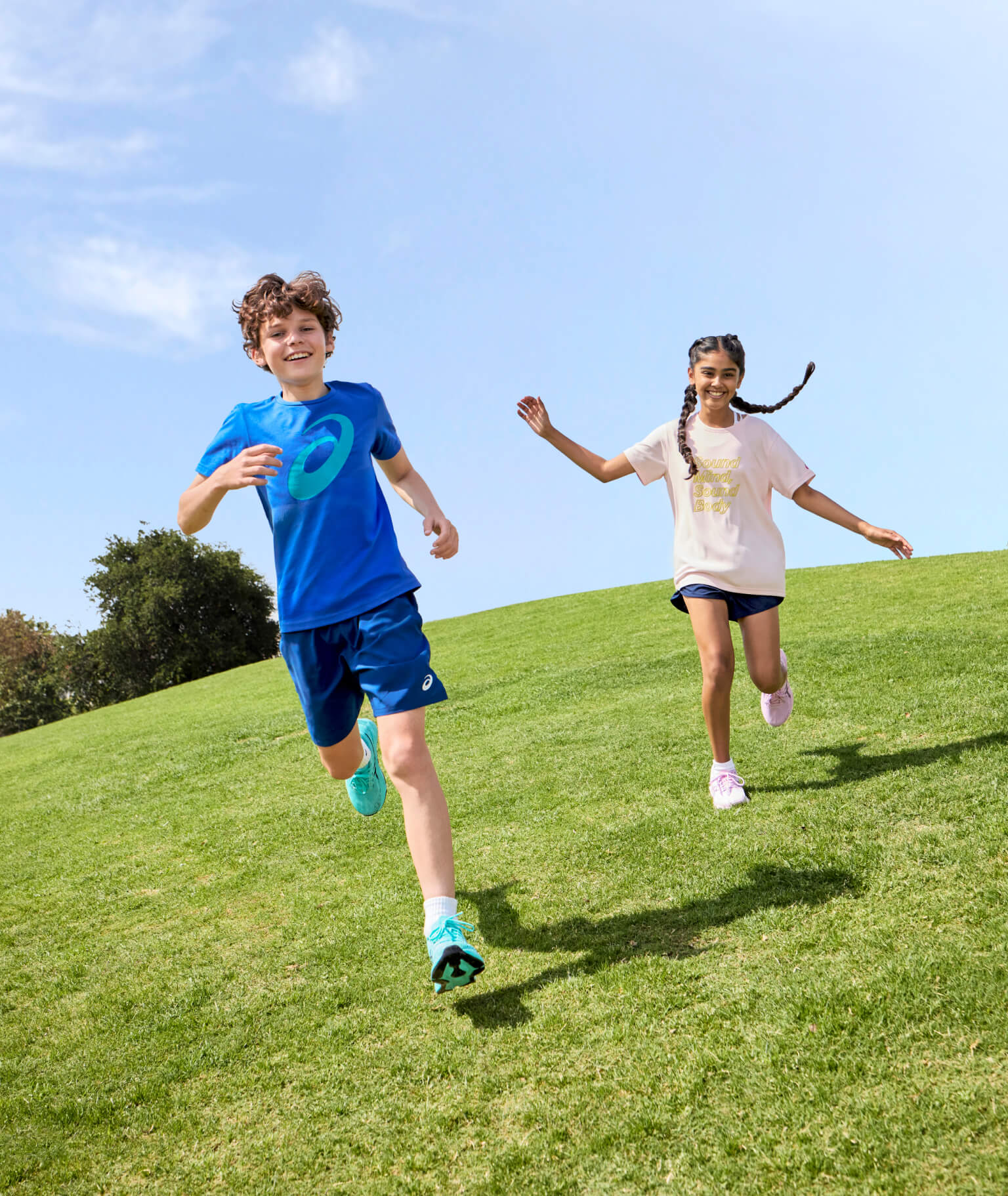 Children wearing ASICS gear
