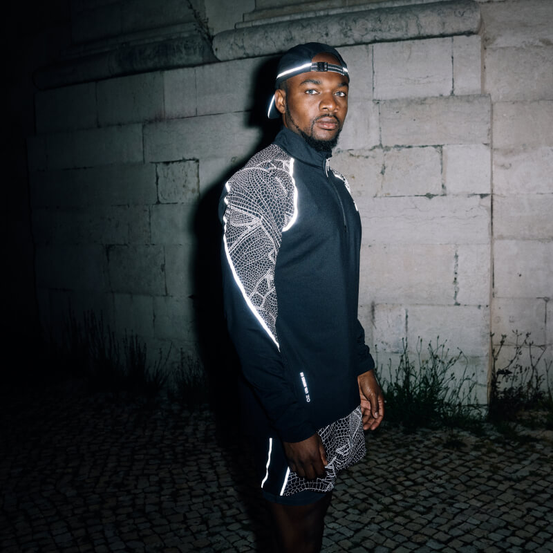 Man wearing the limited series Lite-Show LS Top by ASICS.