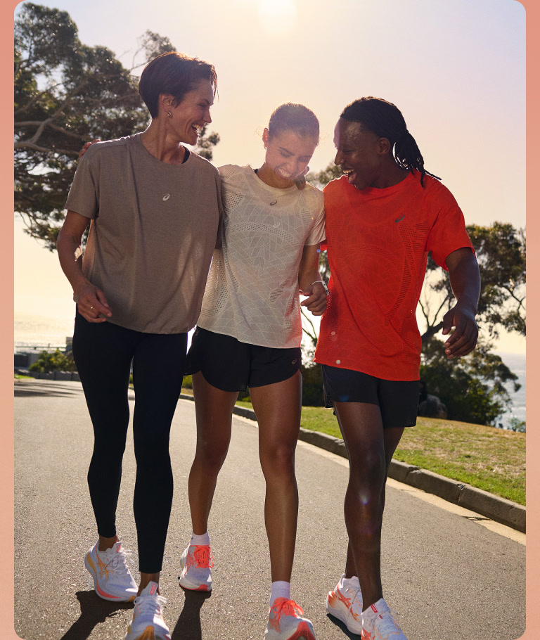Three people walking together wearing ASICS rise and shine collection