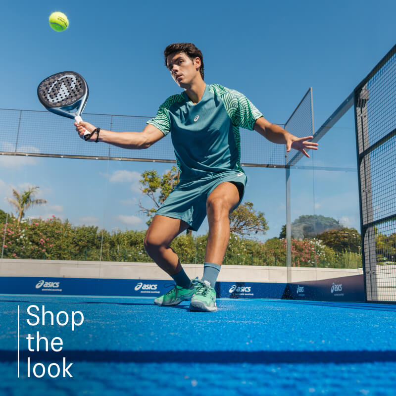 Athlete playing padel wearing padel shoes from ASICS on a blue court.