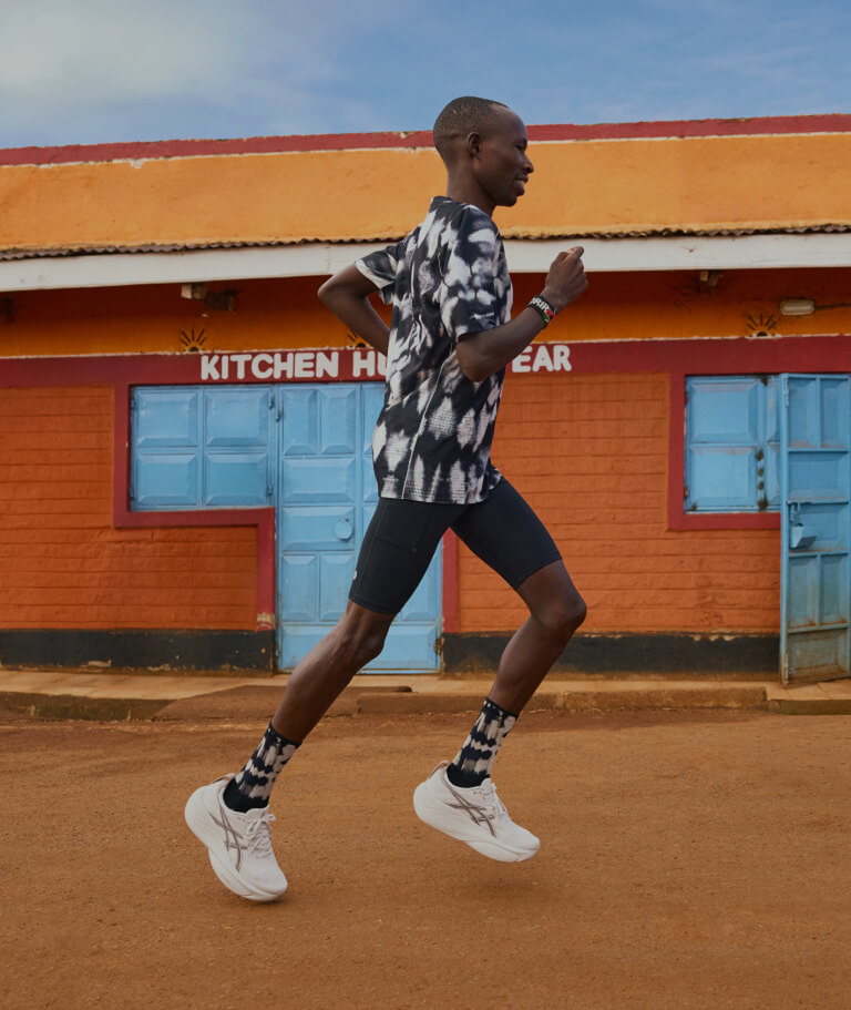 Man running in ASICS Slowcush sneakers