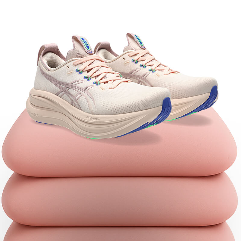 Close up on GEL-NIMBUS 28 in pink colorway resting on a pink pillow