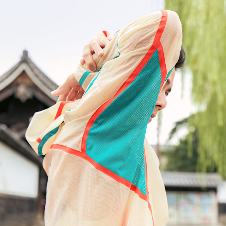 Limited series ASICS foldable jacket close up