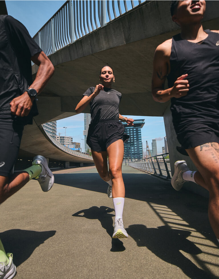 Runners wearing ASICS Platinum Pack Running Clothing
