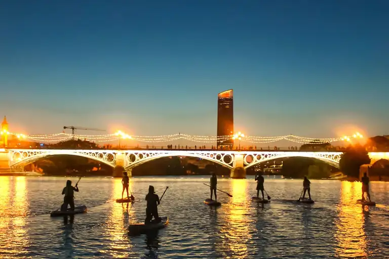 Go for a sunset paddleboarding tour on the river