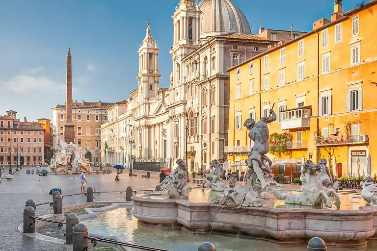 Morning atmosphere next to the fountain in Piazza Navona, Rome