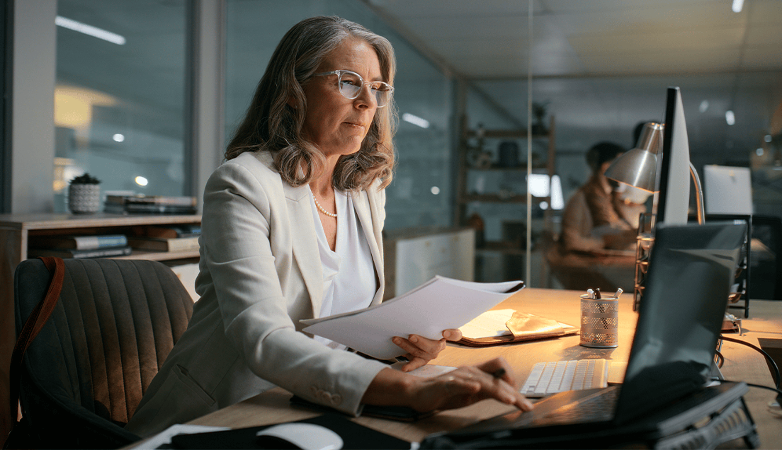 Woman working at desk in office
