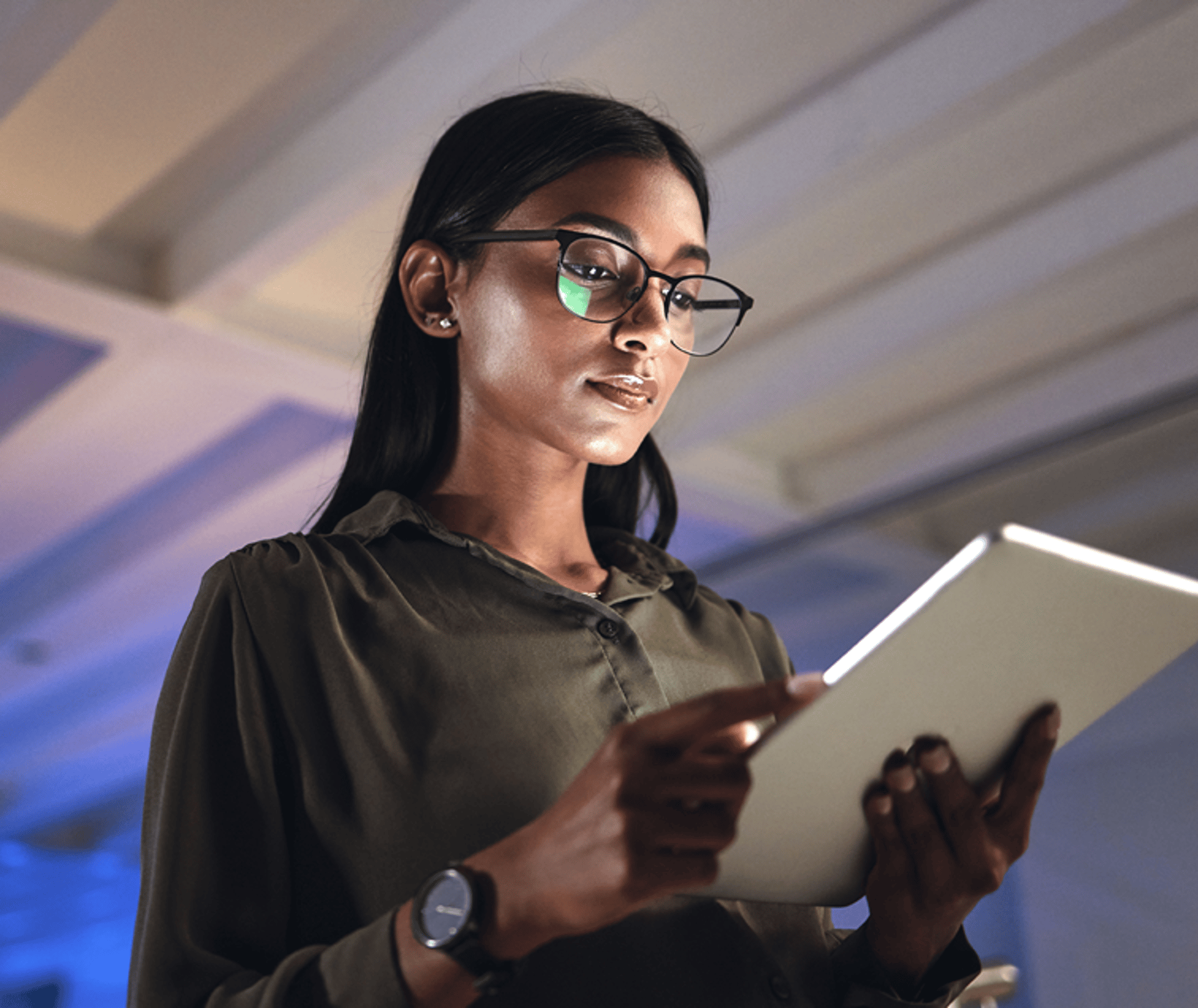 Woman Staring at Tablet
