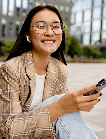 smiling woman on phone