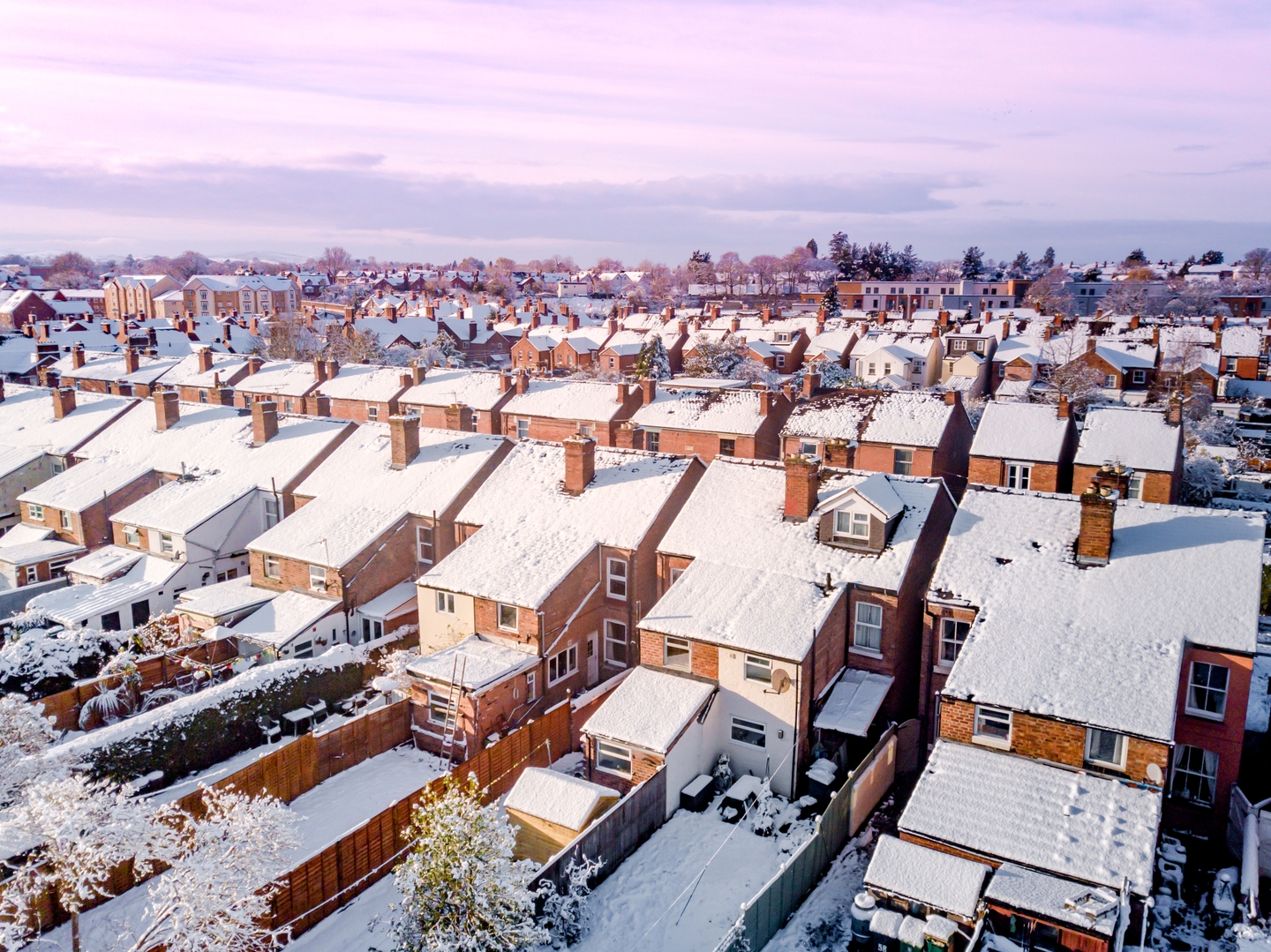 a landscape of homes covered in snow