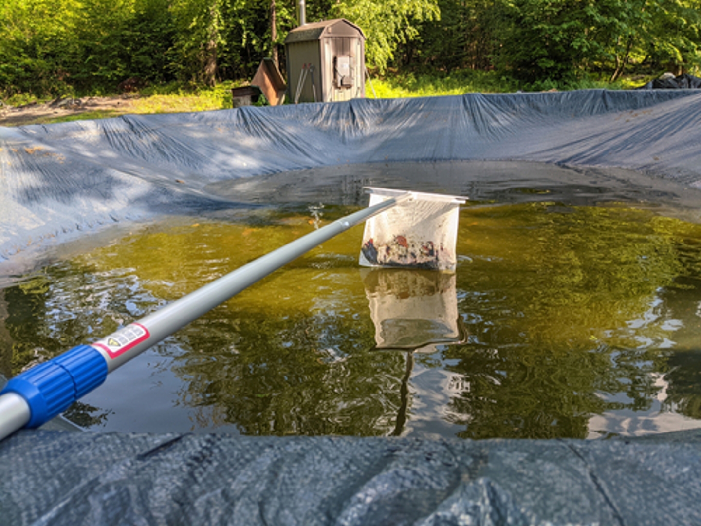 Cleaning a pool cover is part of routine pool maintenance