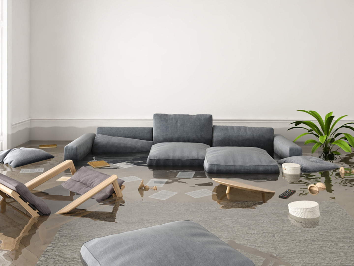 Couch and chair in a flooded living room