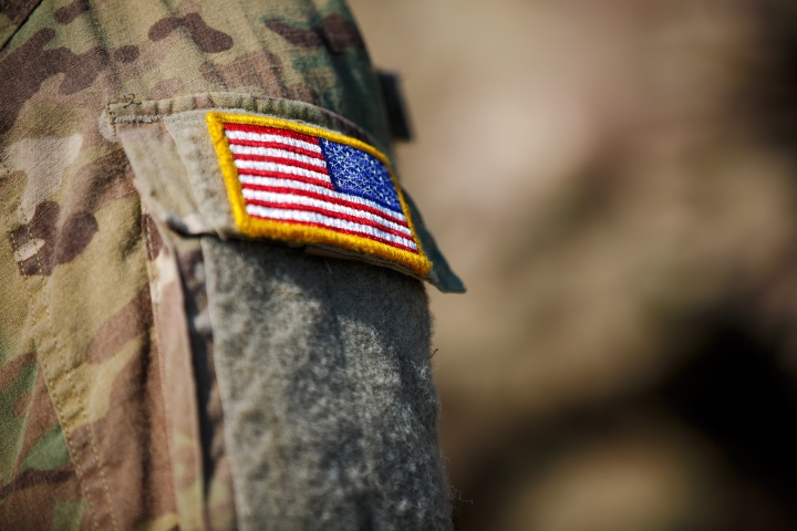 Side of a veteran uniform with the US flag