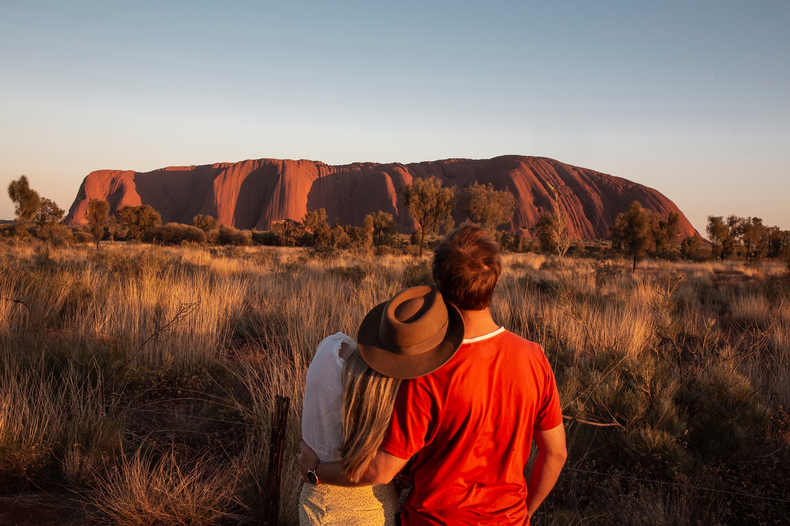 Couple looking at Uluru