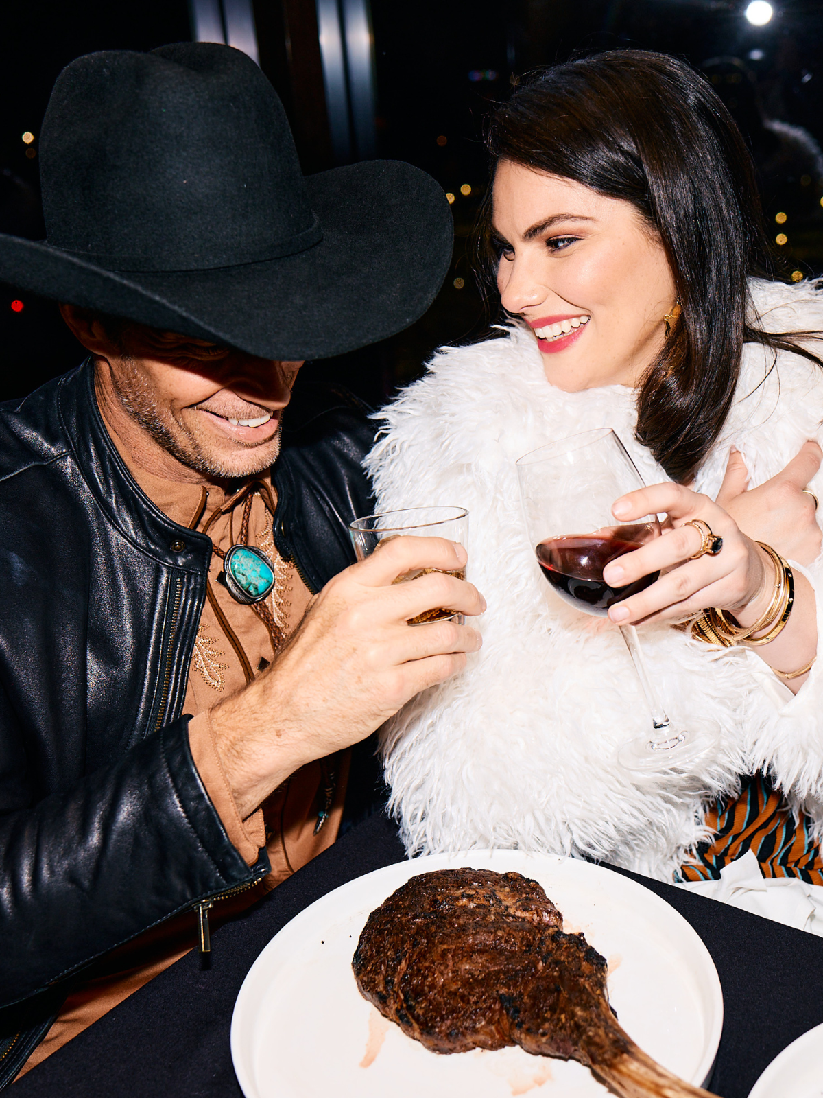 Couple with steak dinner