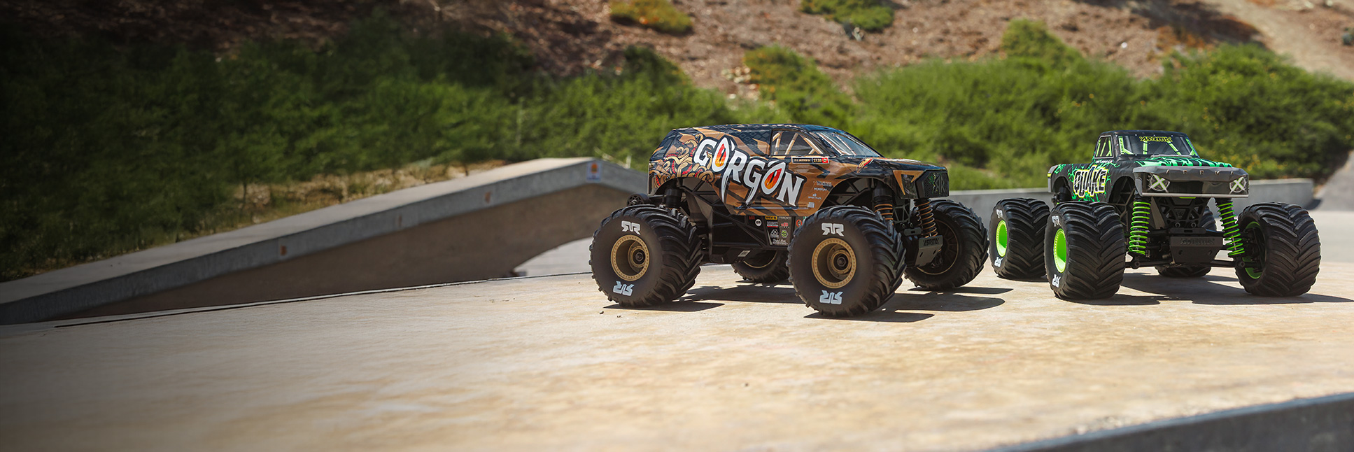Glamour shot of ARRMA QUAKE GROM and GORGON GROM 4X4 RC Monster Trucks