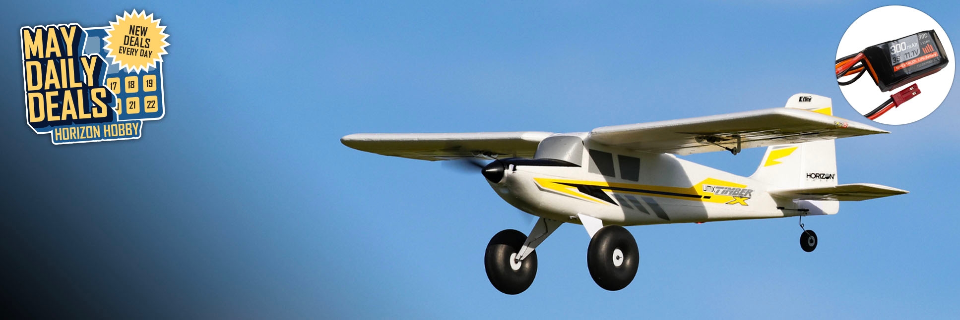 Action shot of E-flite UMX Timber X BNF Basic with AS3X and SAFE Select, 570mm with the May Daily Deals Logo
