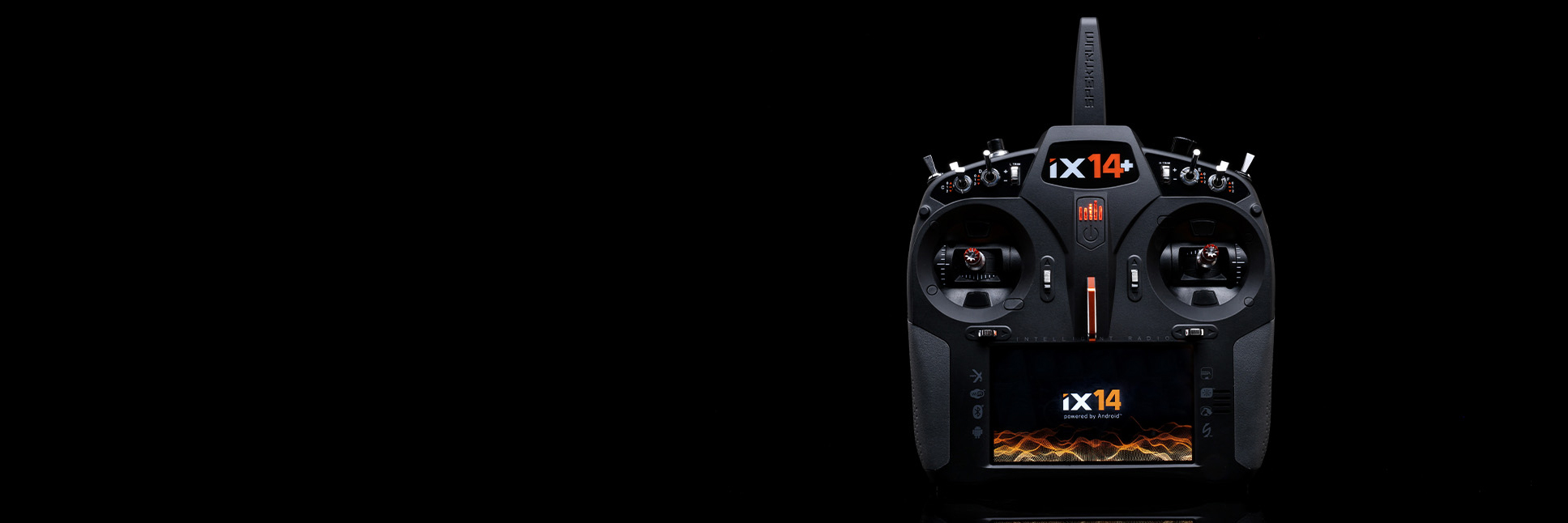 Glamour shot Spektrum iX14+ 20-Channel DSMX Transmitter on a black background