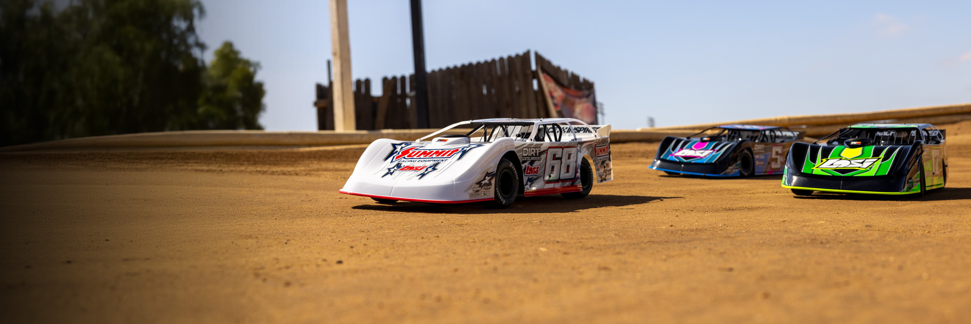 Action shot of the Losi 22S Dirt Late Model racing on the dirt oval track