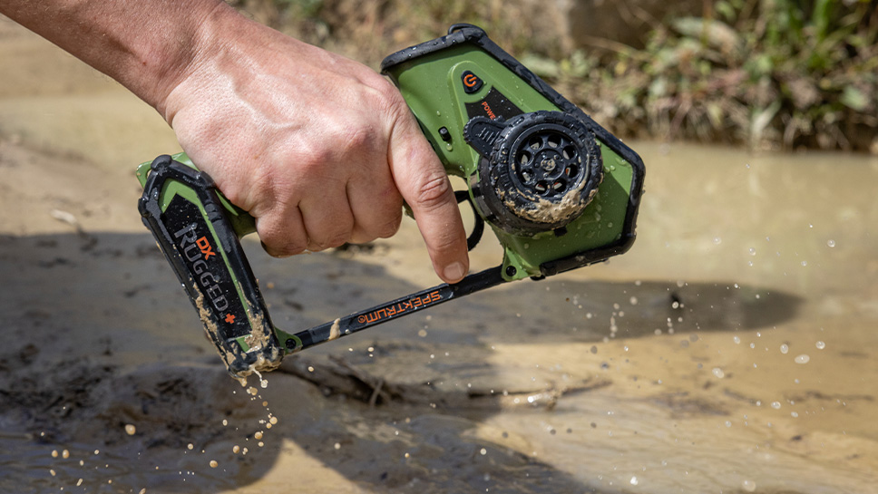 Lifestyle shot of the Spektrum DX+ Rugged 12-Channel DSMR+ Transmitter, Green