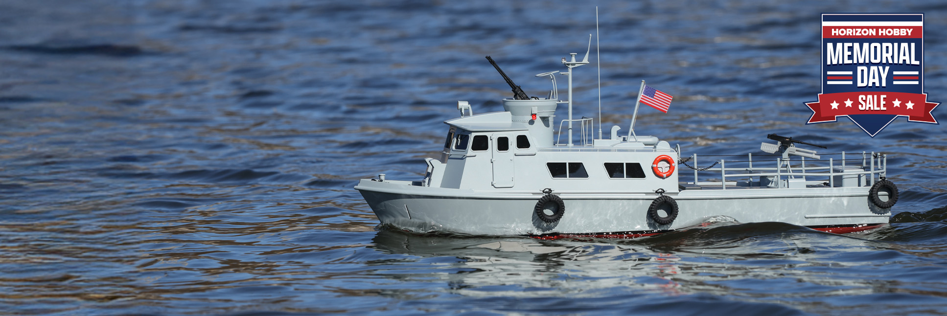 Action shot of Pro Boat PCF Mk I 24 inch Swift Patrol Craft Ready-to-Run RC Boat with the Memorial Day Sale Logo Action shot of Pro Boat PCF Mk I 24 inch Swift Patrol Craft Ready-to-Run RC Boat with the Memorial Day Sale Logo