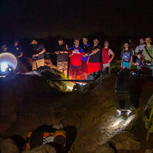 RC Crawlers on a crawler course at night