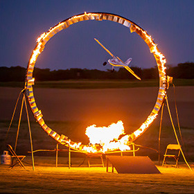 RC Airplane flying through the ring of fire