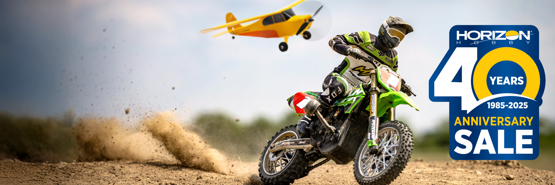 Action shot of Losi Promoto-MX RC Motorcycle and the HobbyZone Champ Anniversary Edition with the Horizon Hobby 40th Anniversary Sale Logo