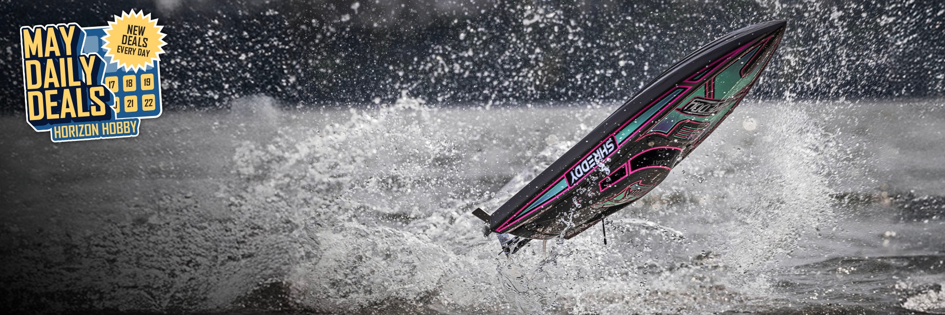Action shot of Pro Boat Recoil 2 V2 26" Self-Righting Brushless Deep-V Ready-to-Run RC Boat with the May Daily Deals Logo Action shot of Pro Boat Recoil 2 V2 26" Self-Righting Brushless Deep-V Ready-to-Run RC Boat with the May Daily Deals Logo